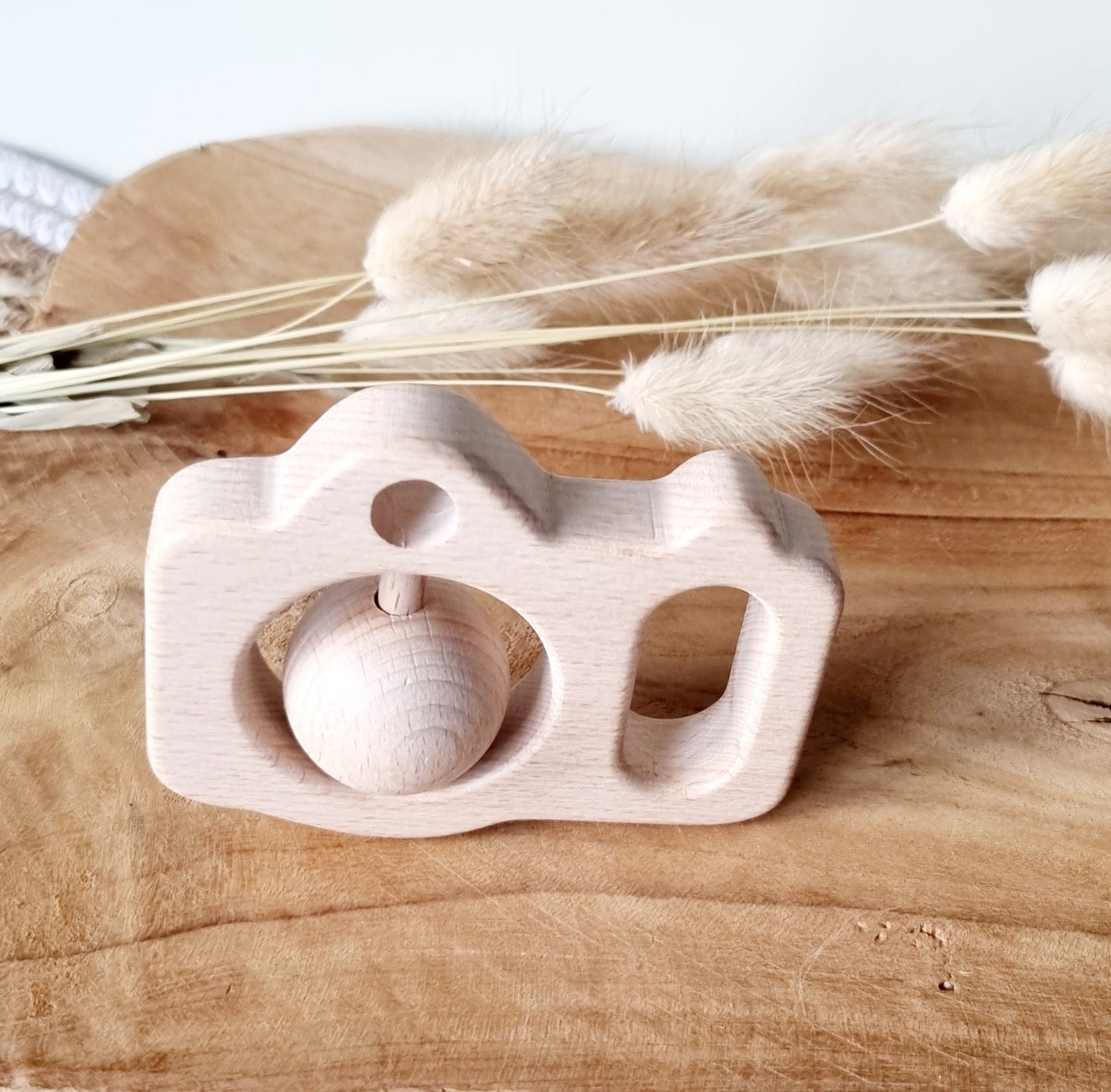 Houten rammelaar Camera