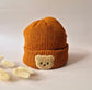 Rammelaartje Beer Beanie – Roestkleurige warme gebreide muts voor baby’s en peuters